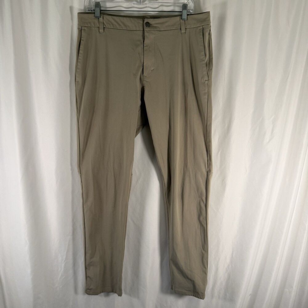 Lululemon ABC Pants Men's 34 Tan Straight Leg Flat Front Chino Pockets Logo